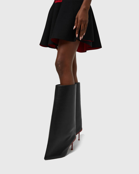 Angiola Slash Flare Knee High Boots In Black