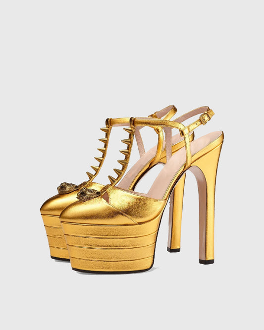 Dionisia Rivet Embellished Strap Platform Heels In Gold