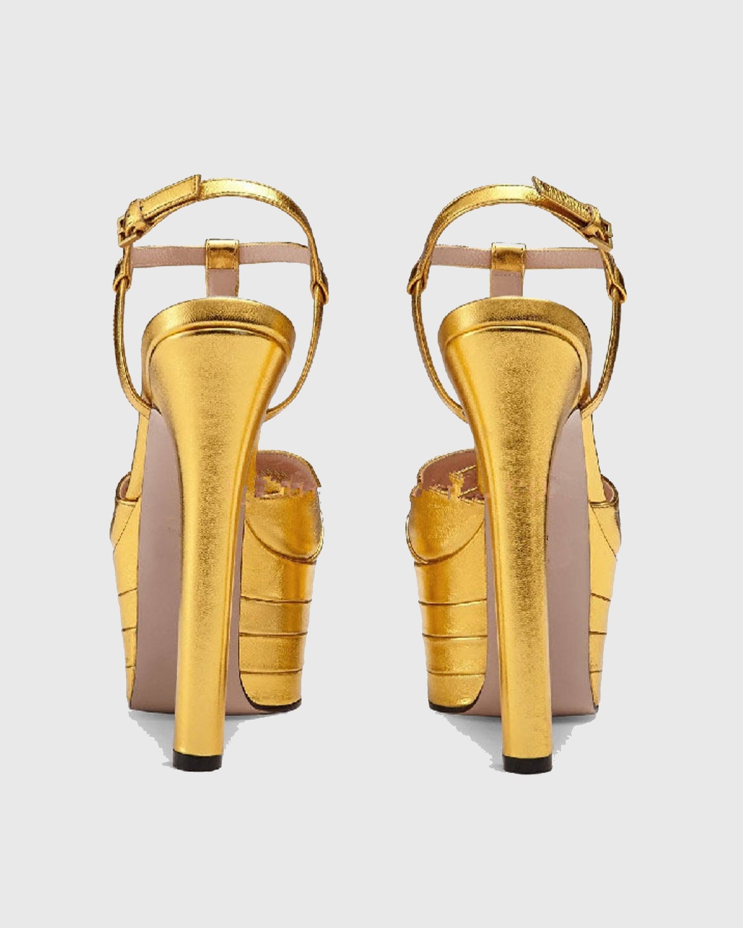 Dionisia Rivet Embellished Strap Platform Heels In Gold