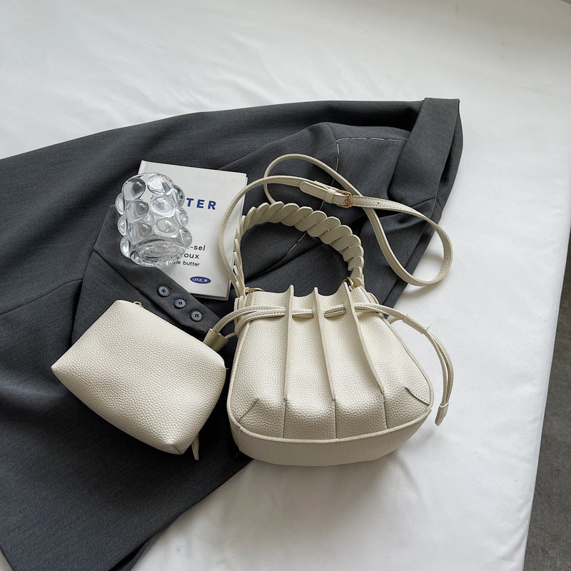 Women Fashionable Simple Solid Color Creased Strap PU Bucket Crossbody Bag