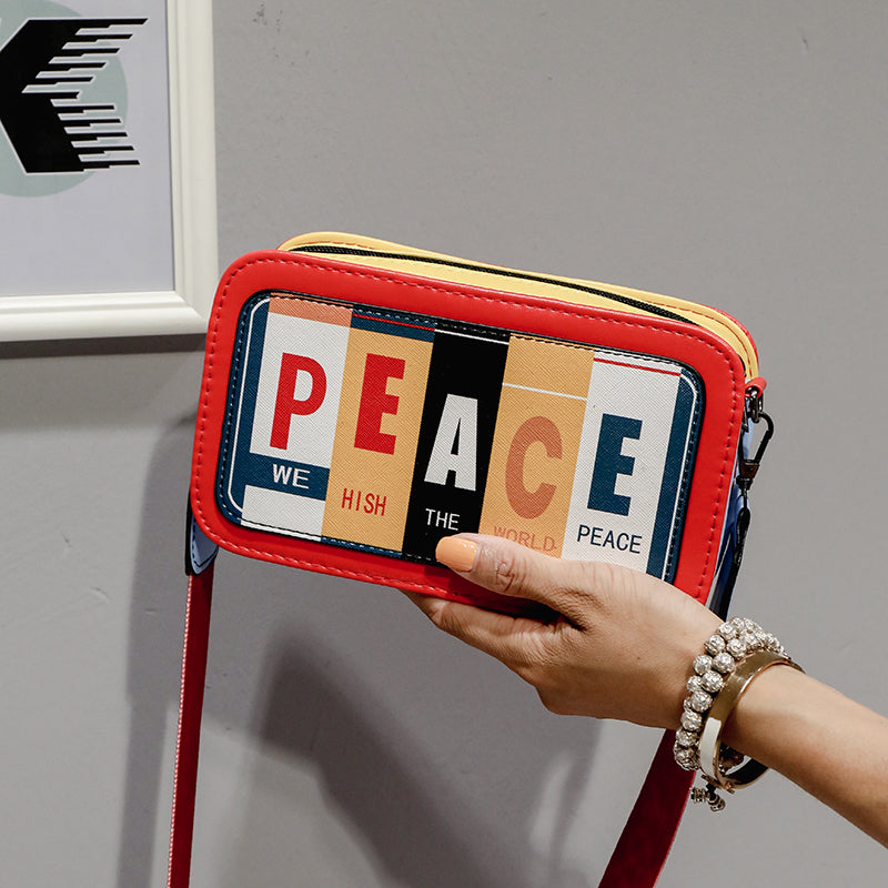 Sac à bandoulière en PU à motif de lettres tendance pour femme, fermeture éclair, blocage des couleurs