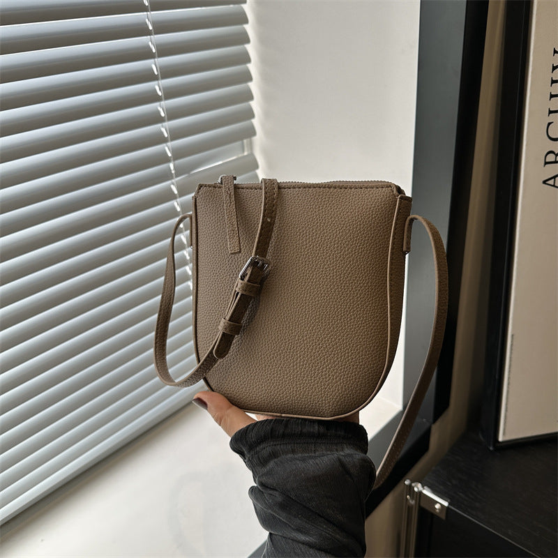 Sac à bandoulière en PU de couleur unie pour femme