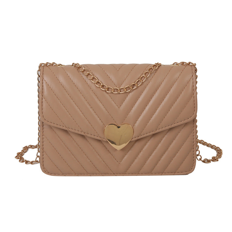 Sac à bandoulière carré à rabat et coutures simples