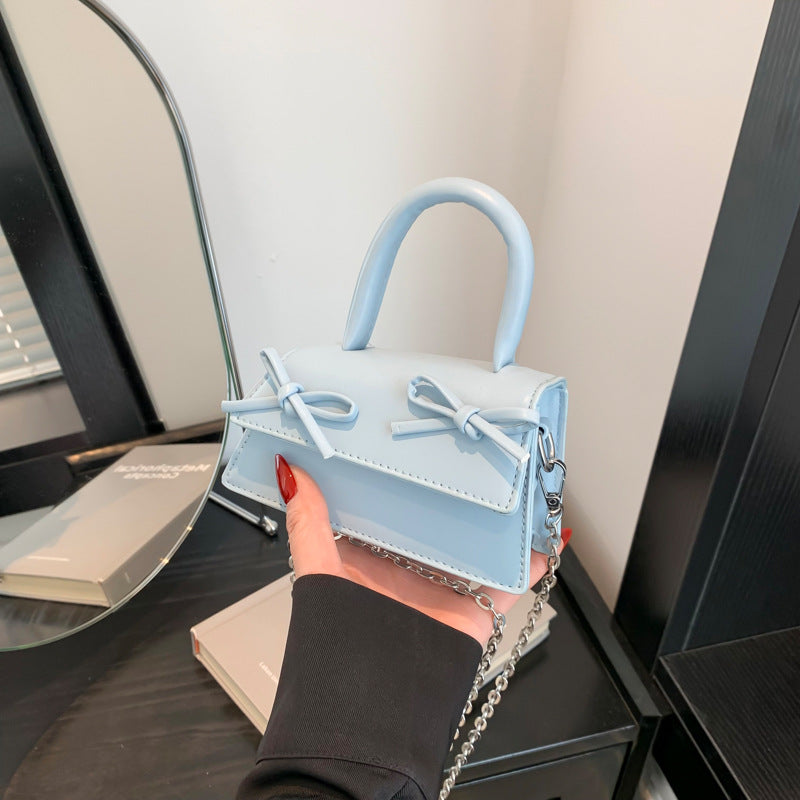 Mini sac bandoulière tendance à chaîne et nœud de couleur unie
