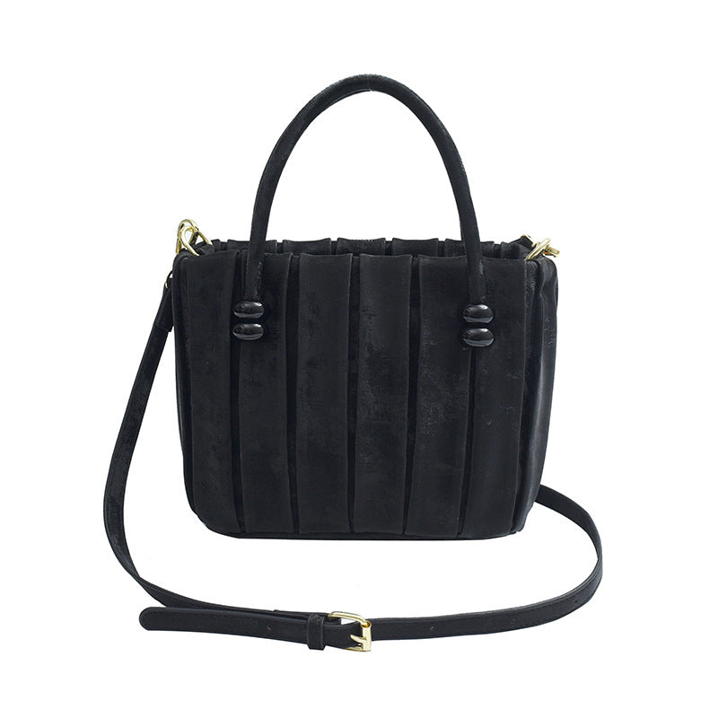 Sac à main plissé simple de couleur unie
