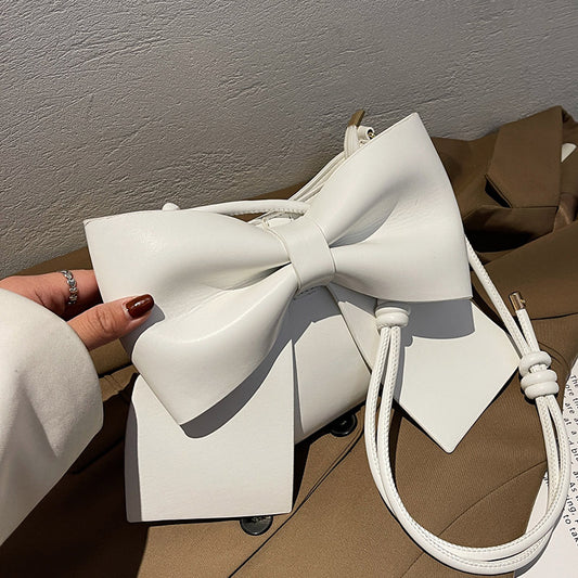 Sac à bandoulière en PU de couleur unie avec nœud créatif pour femme