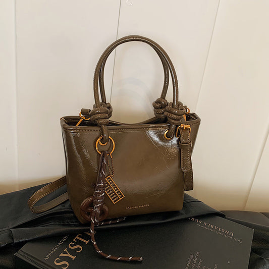 Sac à main décontracté à la mode pour femmes, couleur unie, avec pendentif