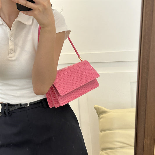 Sac messager à rabat sous les bras à motif pierre simple