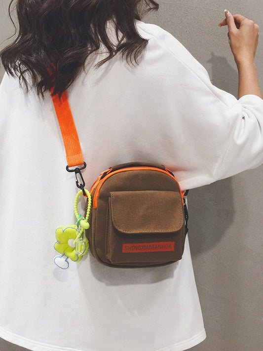 Sac bandoulière en toile contrastée simple et tendance