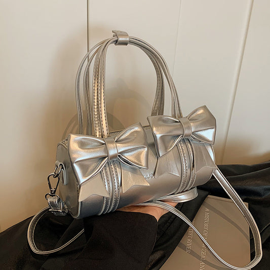 Sac à bandoulière cylindrique décoratif avec nœud décoratif et poignée zippée pour femme