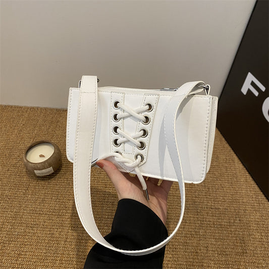 Sac à bandoulière carré à lacets de couleur unie