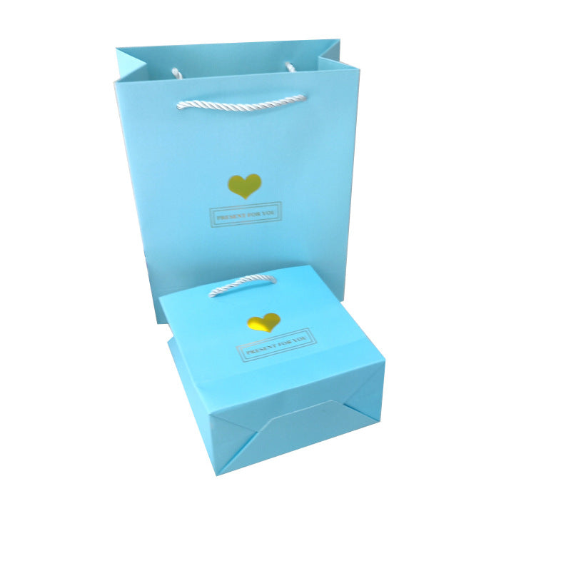 Sac en papier imprimé mini cœur minimaliste et tendance pour emballage cadeau