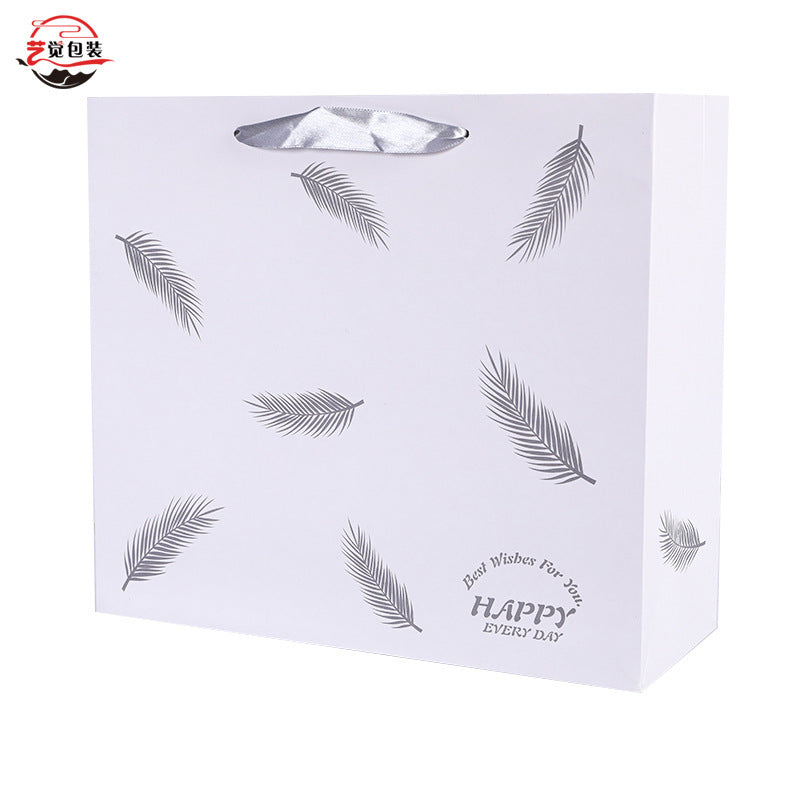 Sac en papier imprimé plumes tendance