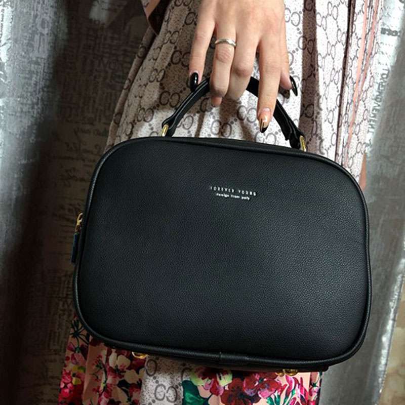 Sac à bandoulière simple et décontracté en PU de couleur pure avec fermeture éclair 