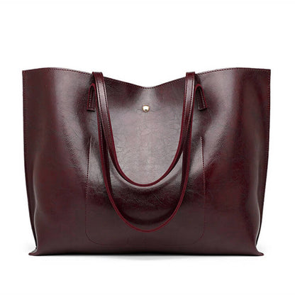 Sac à main tendance en PU à pompons de couleur unie pour femme 