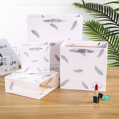 Sac en papier imprimé plumes tendance 