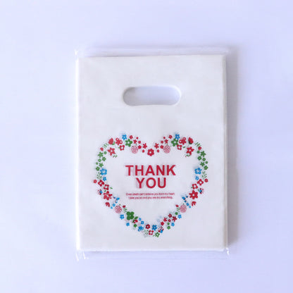 Lot de 100 sacs en plastique pour emballage cadeau, imprimés tendance 