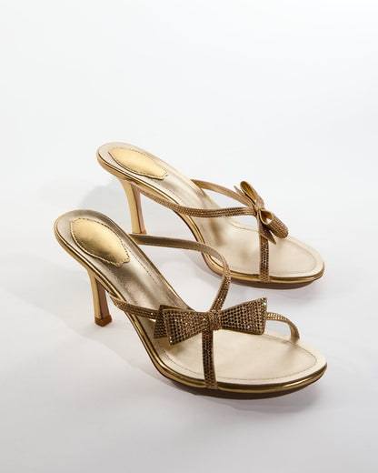 Aafje Rhinestone Bow Cross Strap Slippers In Gold