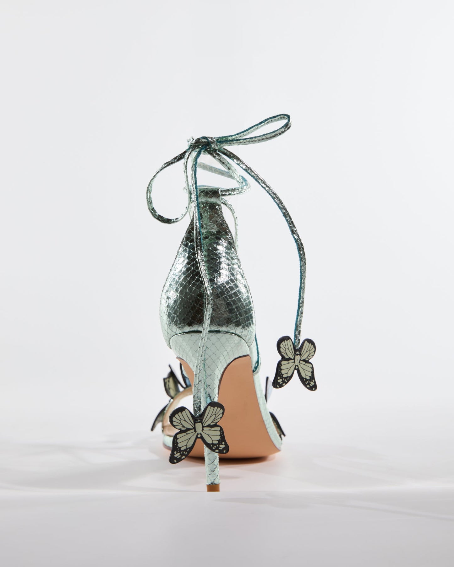 Carla Snake Print Butterfly Embellished Sandals In Green