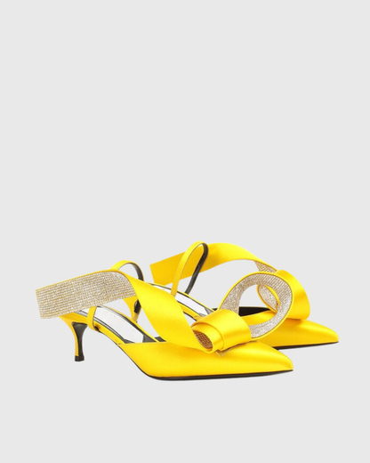 Crocifissa Spiral Rhinestone Bow Mules In Butter Yellow