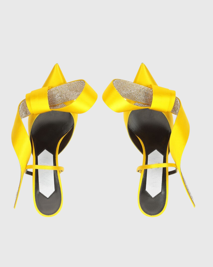 Crocifissa Spiral Rhinestone Bow Mules In Butter Yellow