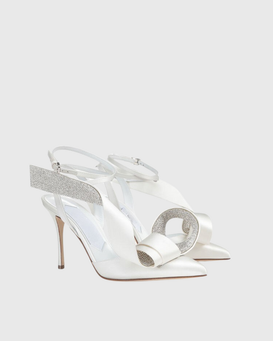 Crocifissa Spiral Rhinestone Bow Pumps In White