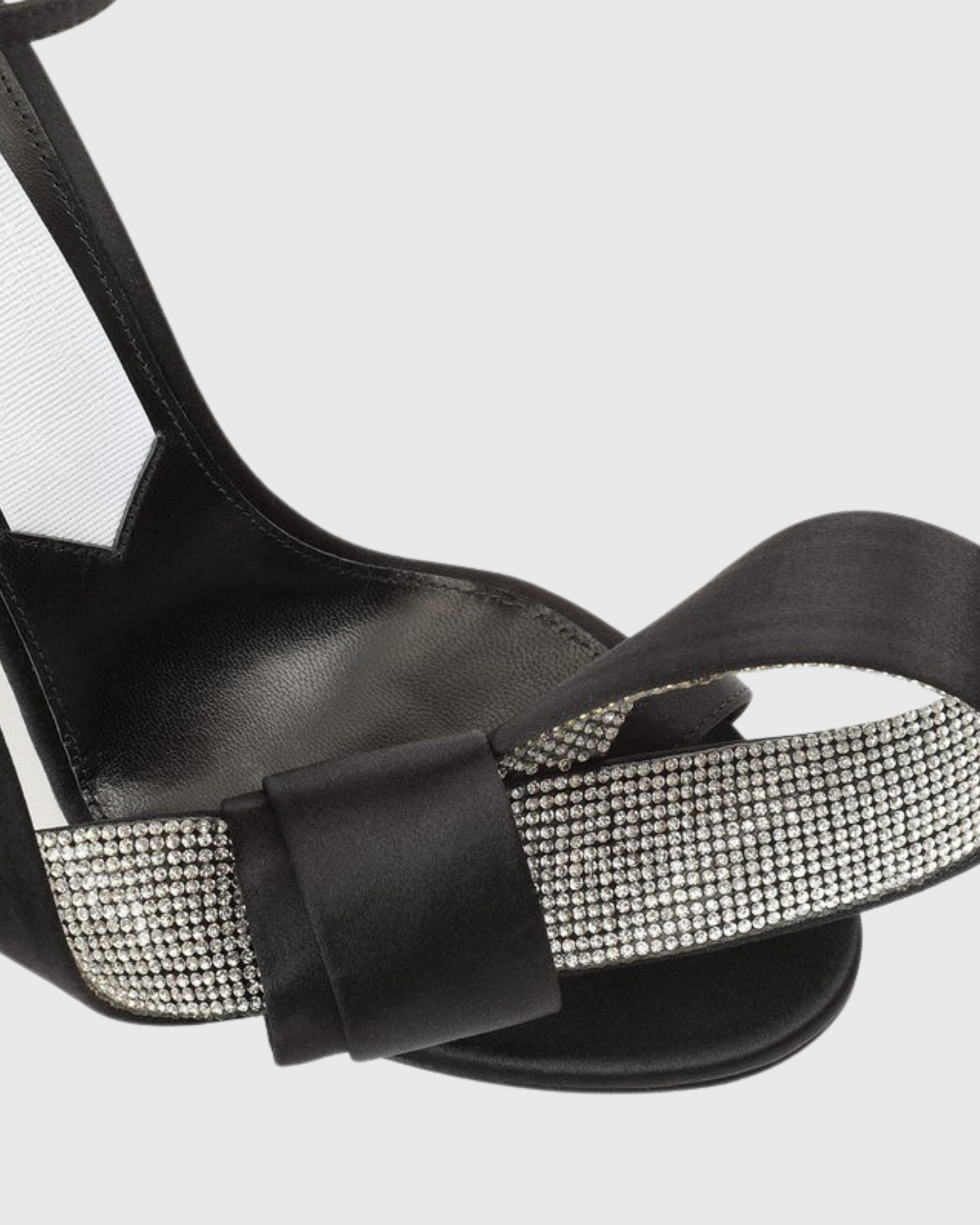 Crocifissa Spiral Rhinestone Bow Strap Sandals In Black