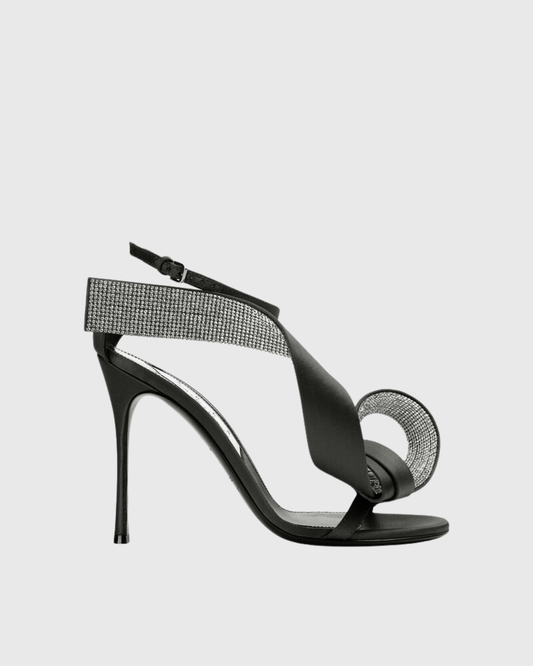 Crocifissa Spiral Rhinestone Bow Strap Sandals In Black