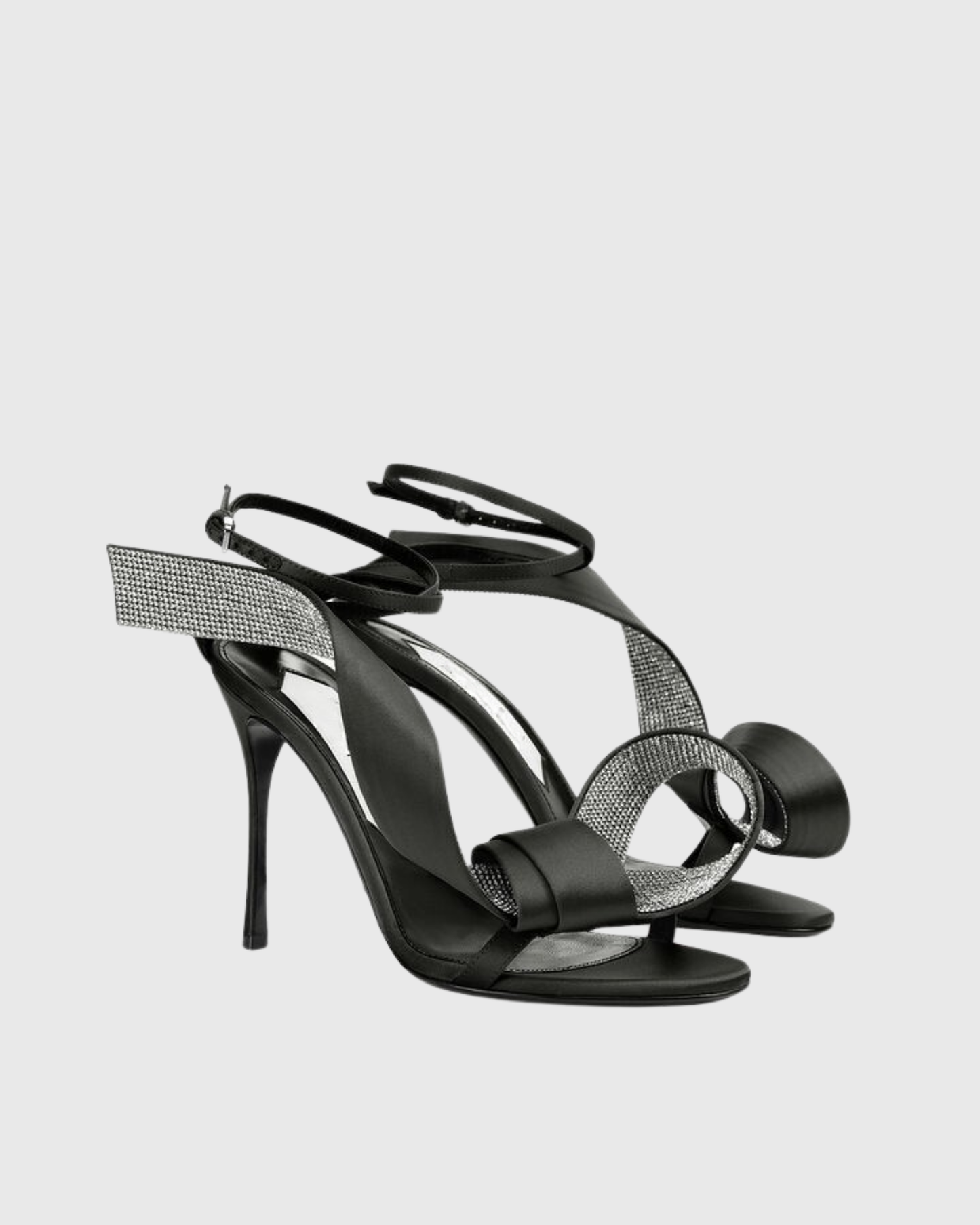 Crocifissa Spiral Rhinestone Bow Strap Sandals In Black