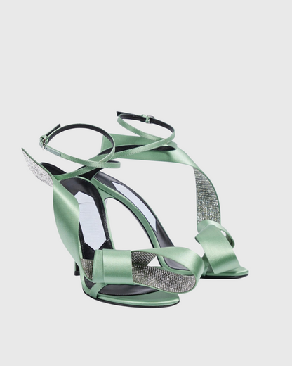 Crocifissa Spiral Rhinestone Bow Strap Sandals In Green