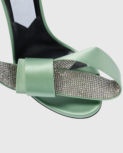 Crocifissa Spiral Rhinestone Bow Strap Sandals In Green