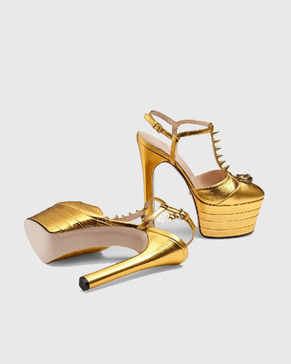 Dionisia Rivet Embellished Strap Platform Heels In Gold