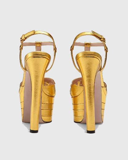 Dionisia Rivet Embellished Strap Platform Heels In Gold
