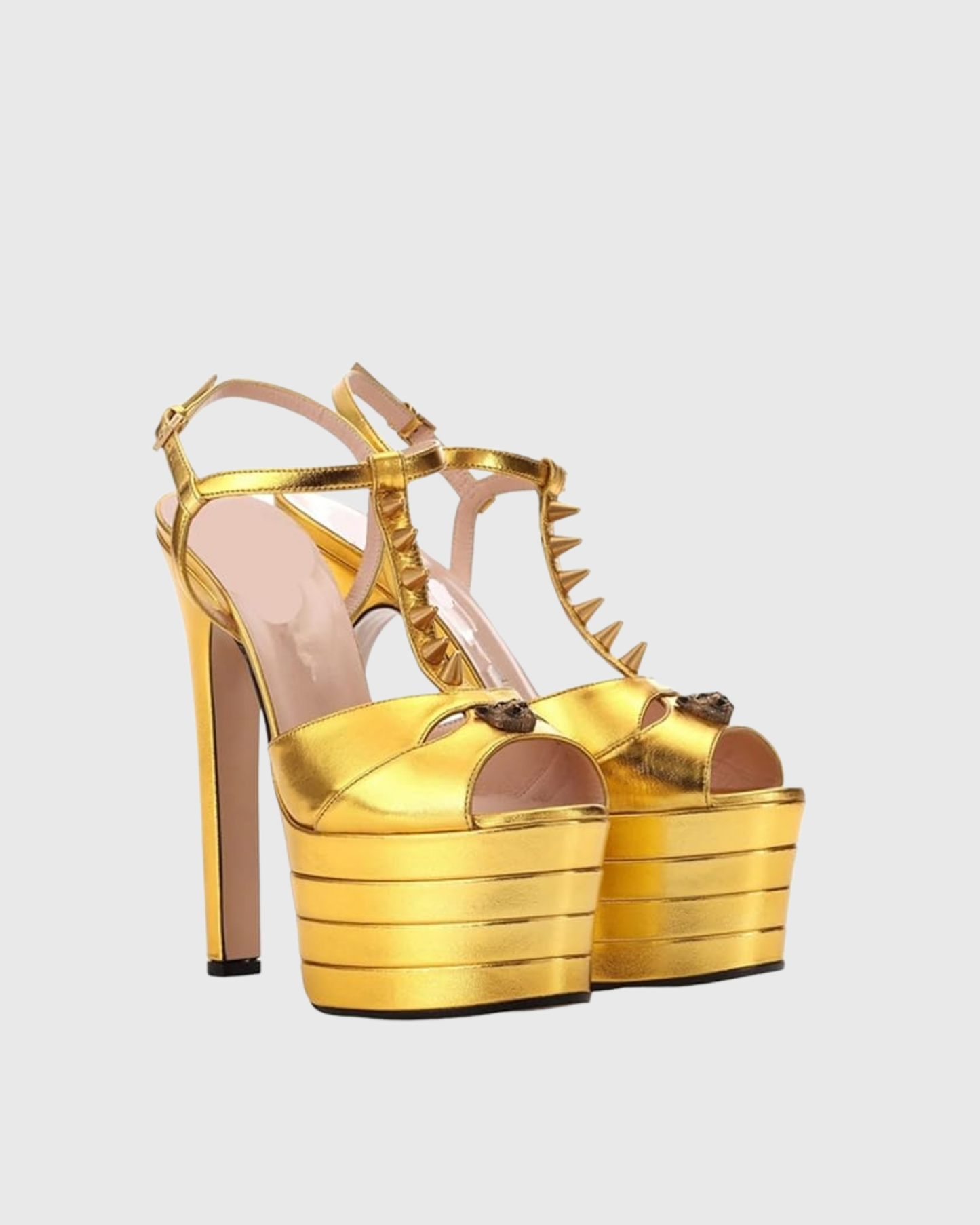 Dionisia Rivet Strap Platform Heels In Gold