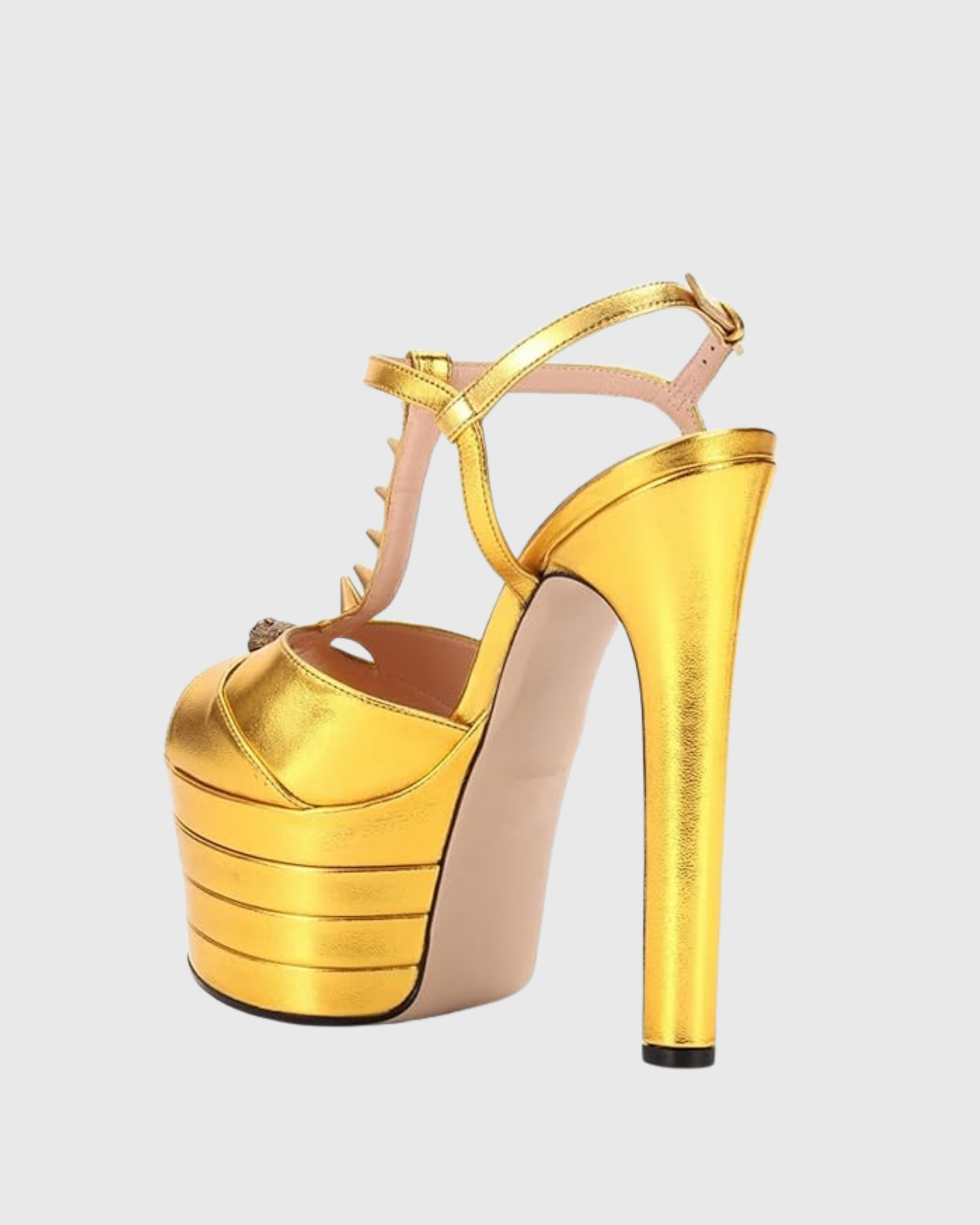 Dionisia Rivet Strap Platform Heels In Gold