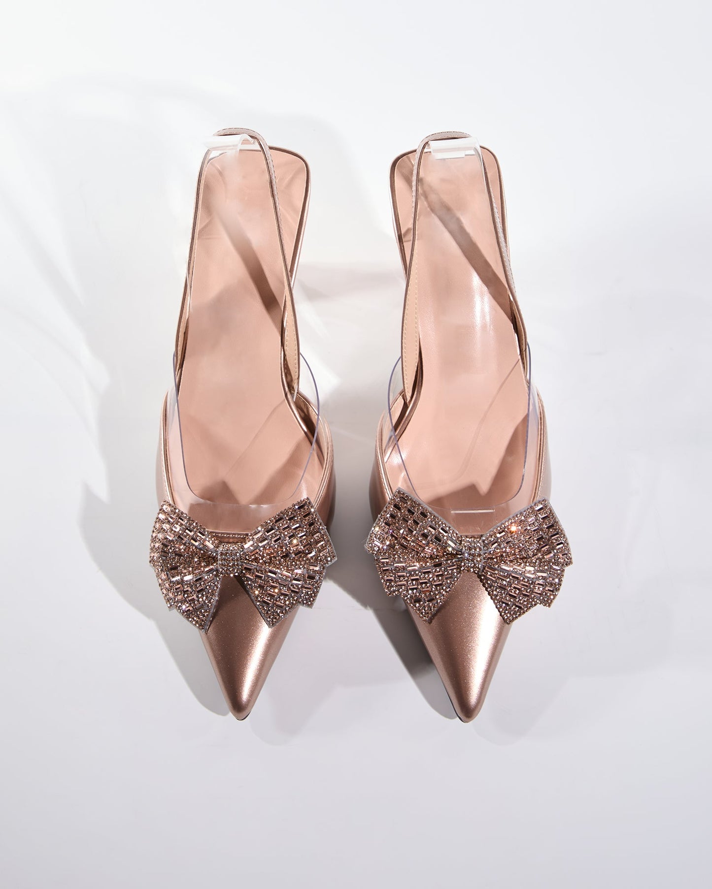 Elena Rhinestone Bow Flared Heels In Rose Gold
