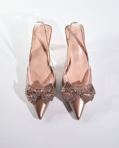 Elena Rhinestone Bow Flared Heels In Rose Gold