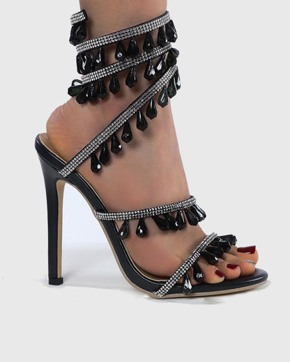 Elisa Diamond Fringe Snake Sandals In Black