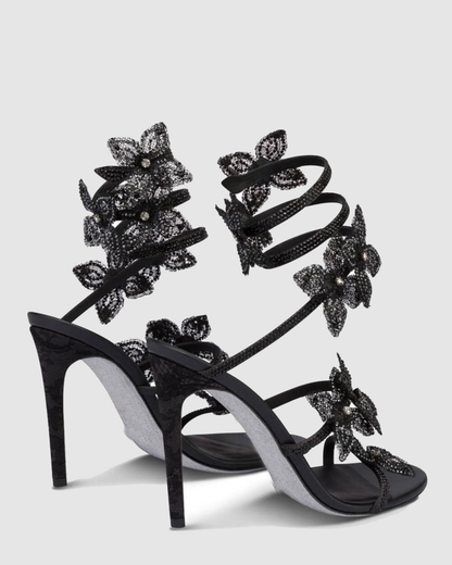 Elisa Flower Embellished Snake Sandals In Black
