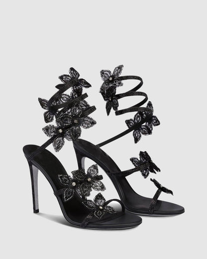 Elisa Flower Embellished Snake Sandals In Black
