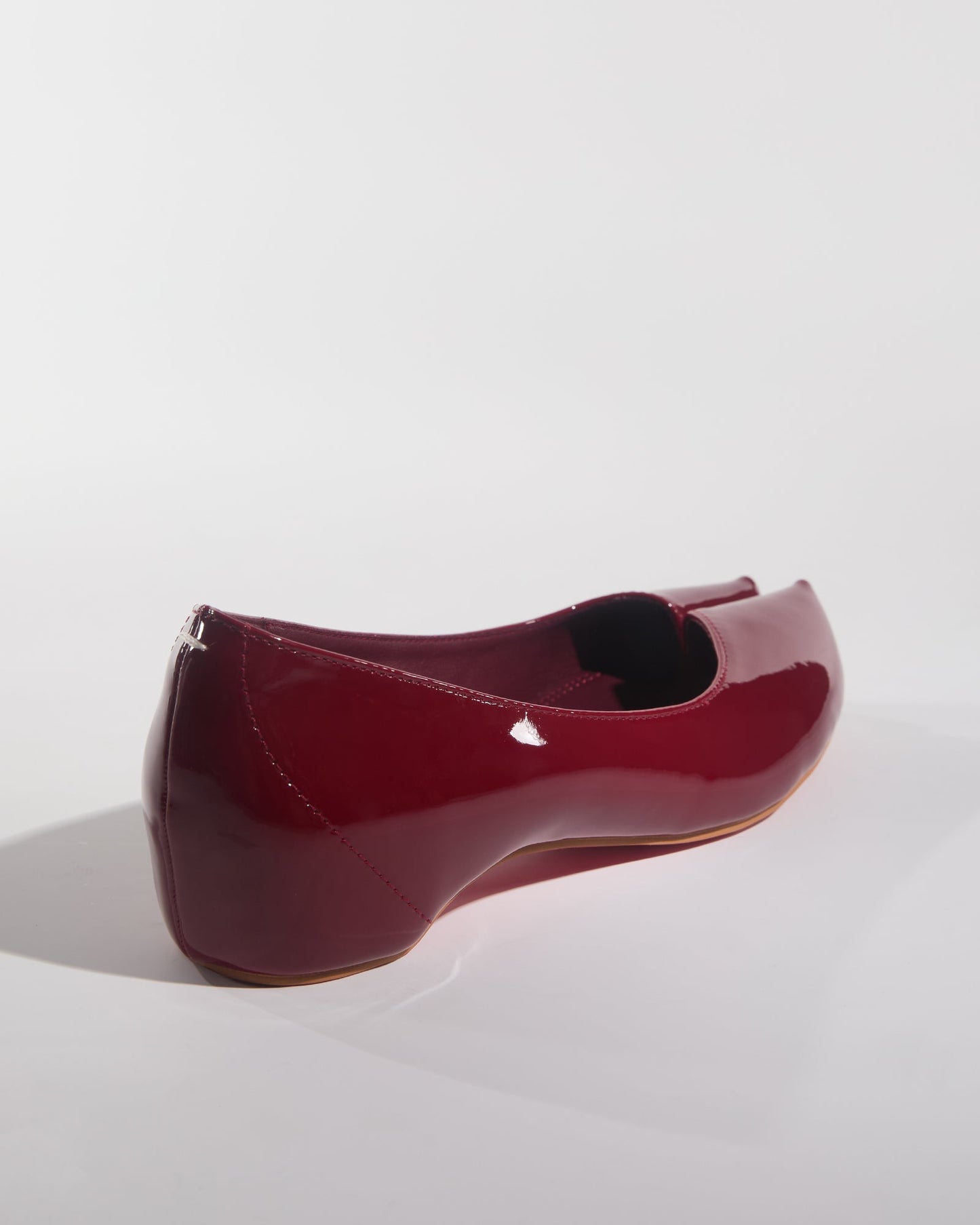 Fiore Patent Leather Tabi Pumps In Wine