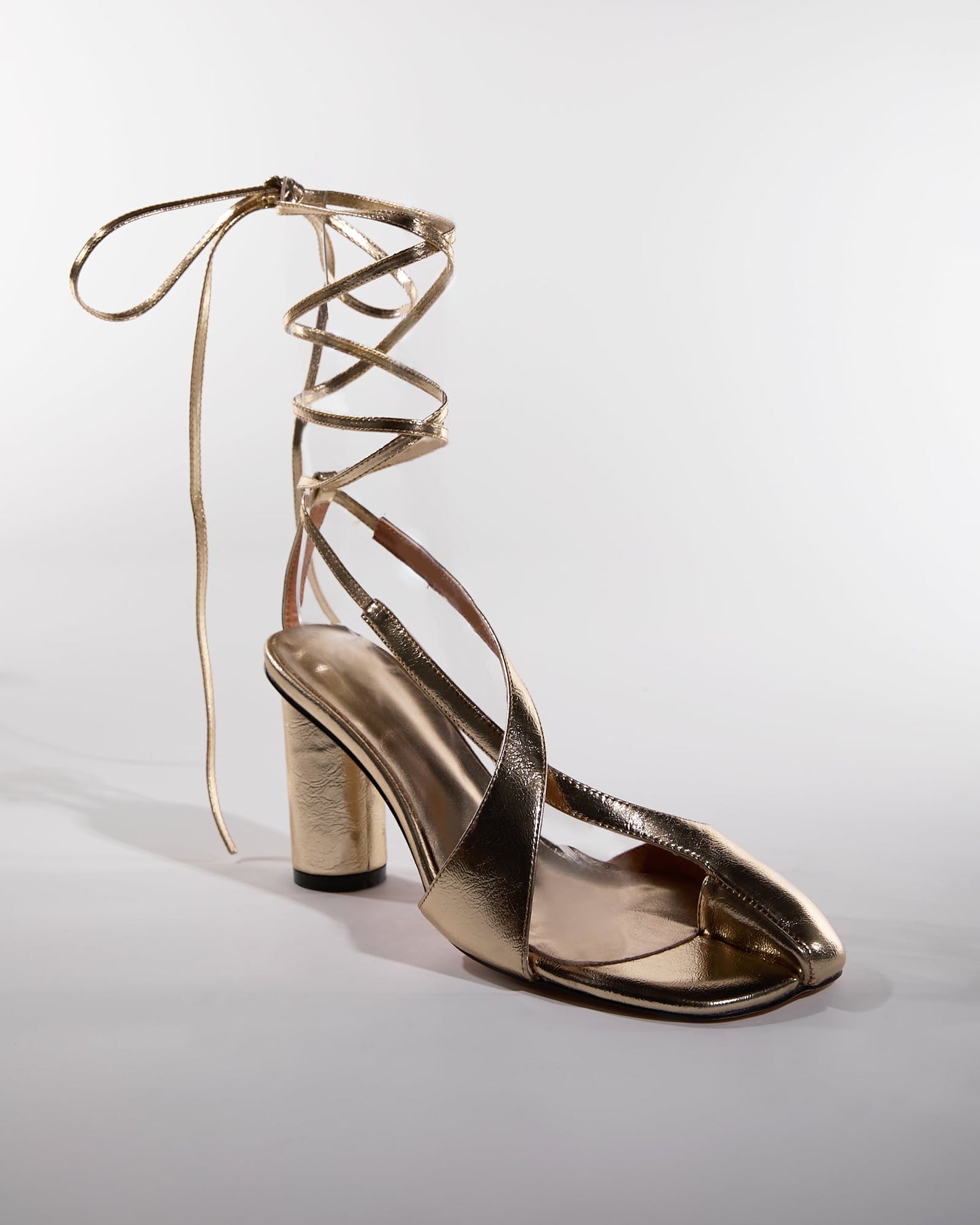 Fiore Split Toe Lace Up Sandals In Gold