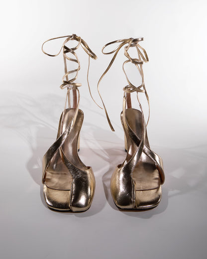 Fiore Split Toe Lace Up Sandals In Gold