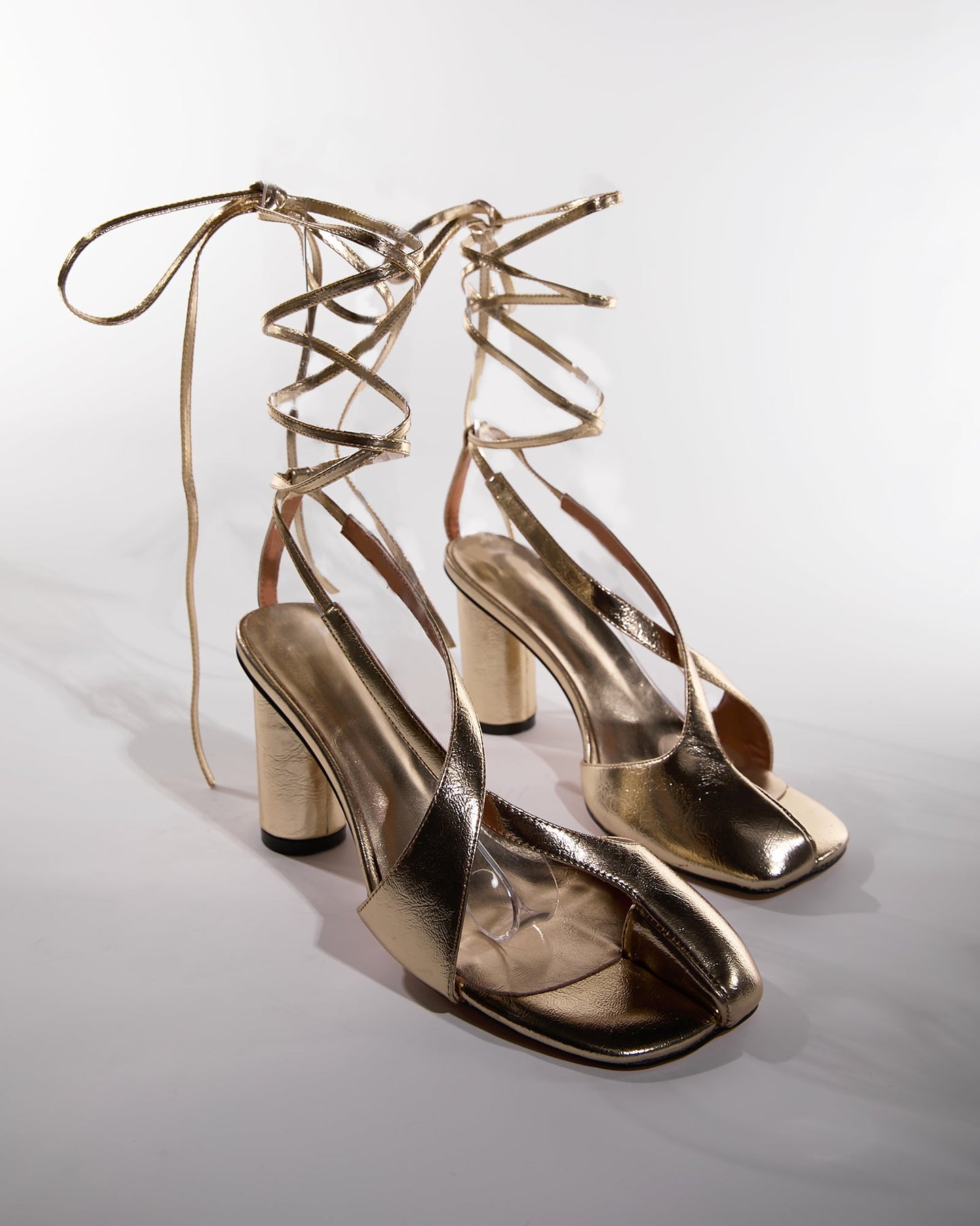 Fiore Split Toe Lace Up Sandals In Gold