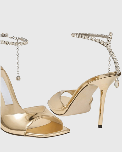 Gilberta Metallic Rhinestone Strap Sandals In Gold