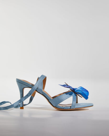 Io Butterfly Cross Strap Sandals In Blue