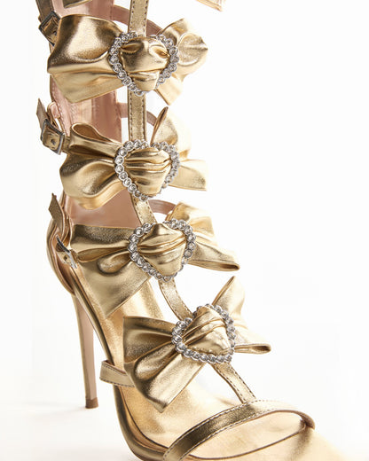 Lola Bow Strap Cutout Sandals In Gold