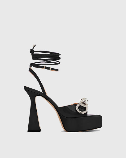 Rina Crystal Bow Lace Up Platform Flared Sandals In Black