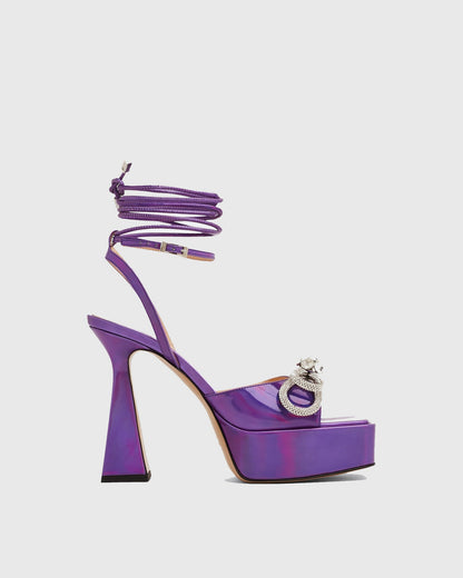 Rina Crystal Bow Lace Up Platform Flared Sandals In Purple