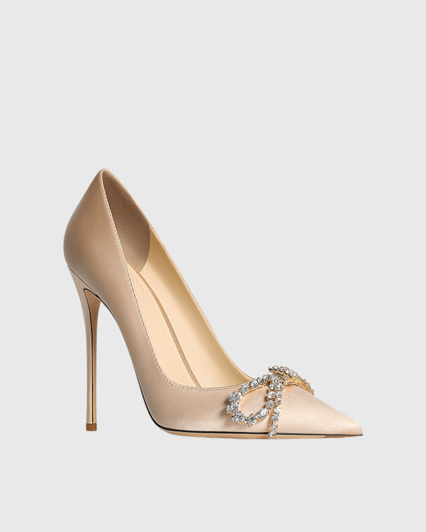 Rina Rhinestone Bow Pumps In Champagne